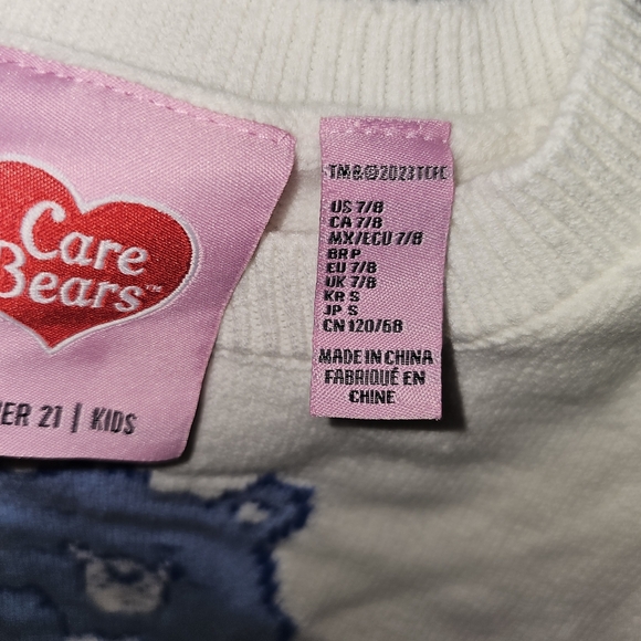 Forever 21 Kids White Sweater with Blue Care Bear Design Grumpy Bear - Picture 6 of 14